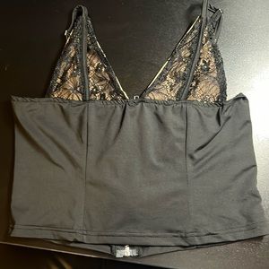 Cute top! Not sure the brand but never worn. Size M